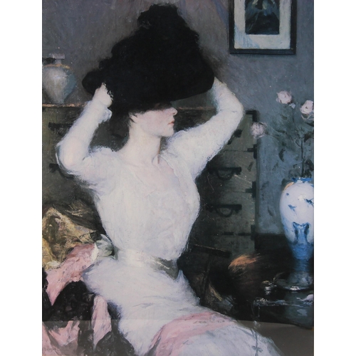 185 - * After Frank Weston Benson (American, 1862-1951),  
Lady Trying On A Hat (The Black Hat),  
Print o... 