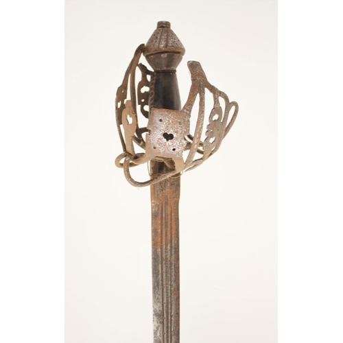 276 - A Highland Basket-hilted broadsword, second quarter 18th century, with broad blade cut with a series... 