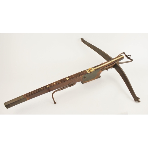 278 - A Flemish target crossbow, 18th century, with robust iron bow retained by a pair of large iron brack... 