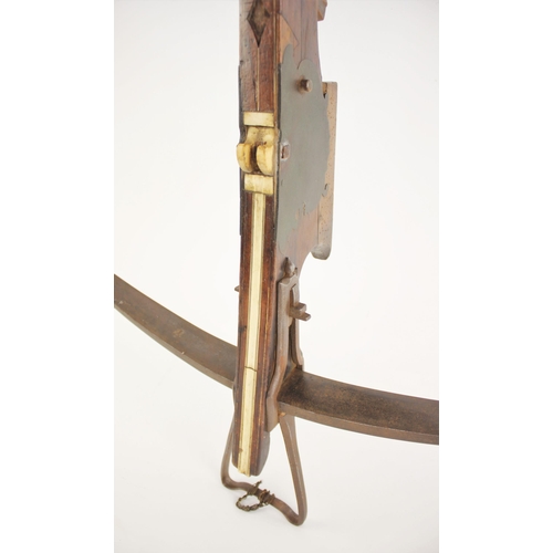 278 - A Flemish target crossbow, 18th century, with robust iron bow retained by a pair of large iron brack... 