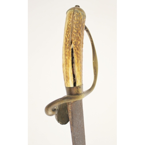 281 - A Hunting Hanger, circa 1730/40, probably English, with brass hilt cast in low relief, including flu... 