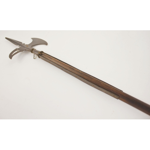 284 - A Continental Sergeant’s Halberd, second half 17th century, on an early wooden haft, head length 71c... 