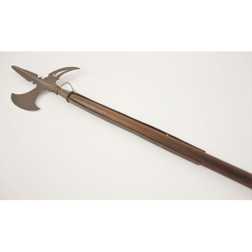 284 - A Continental Sergeant’s Halberd, second half 17th century, on an early wooden haft, head length 71c... 