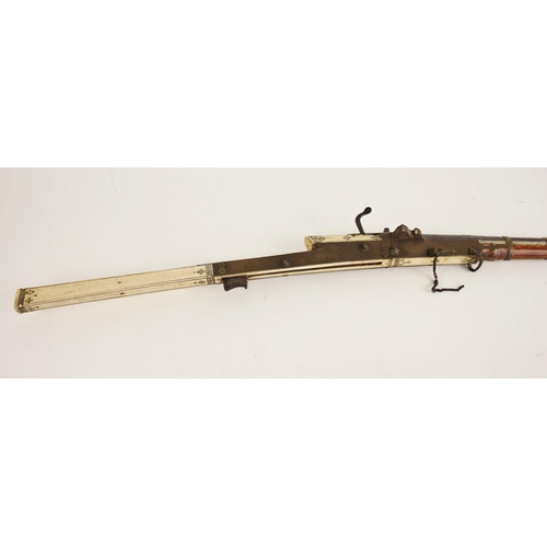 288 - An Indian Matchlock Musket (Toredar), late 18th / early 19th century, with long slender barrel damas... 