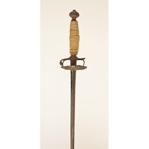 300 - A small-sword, circa 1700, with slender fullered blade, lightly chiselled iron hilt involving a doub... 