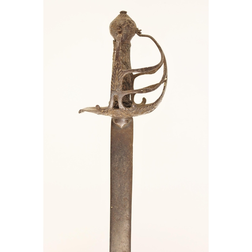 304 - A Mortuary-hilted Backsword, mid-17th century, with flat blade tapering to a blunt point, the hilt f... 