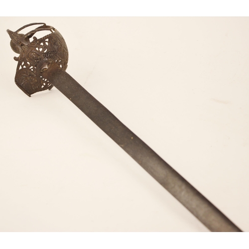 304 - A Mortuary-hilted Backsword, mid-17th century, with flat blade tapering to a blunt point, the hilt f... 