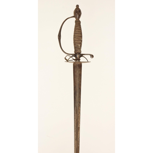 311 - A cut-steel Small-sword, circa 1780/90, with tapering hollow-triangular blade, the hilt with oval gu... 