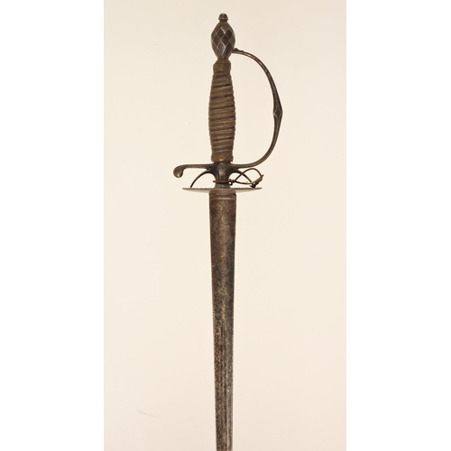 311 - A cut-steel Small-sword, circa 1780/90, with tapering hollow-triangular blade, the hilt with oval gu... 