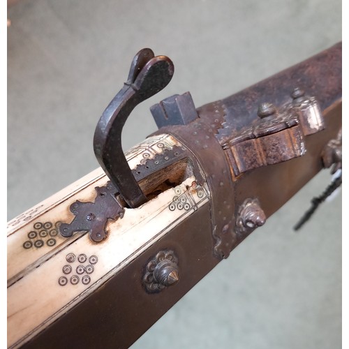 288 - An Indian Matchlock Musket (Toredar), late 18th / early 19th century, with long slender barrel damas... 