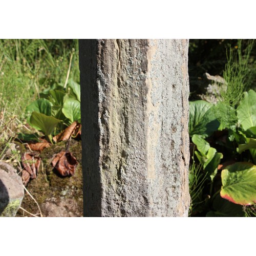 728 - * A sandstone plinth of hexagonal form, with sundial, raised on a capital, 105cm H