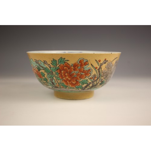 332 - A Chinese porcelain famile verte bowl, 18th century, the exterior decorated with flowering peonies a... 