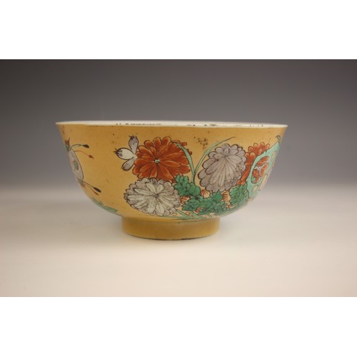 332 - A Chinese porcelain famile verte bowl, 18th century, the exterior decorated with flowering peonies a... 