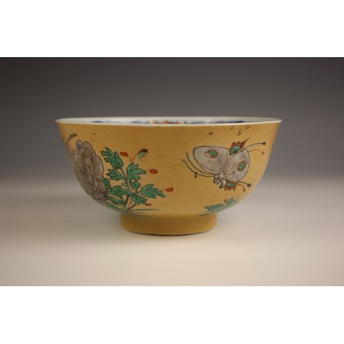 332 - A Chinese porcelain famile verte bowl, 18th century, the exterior decorated with flowering peonies a... 