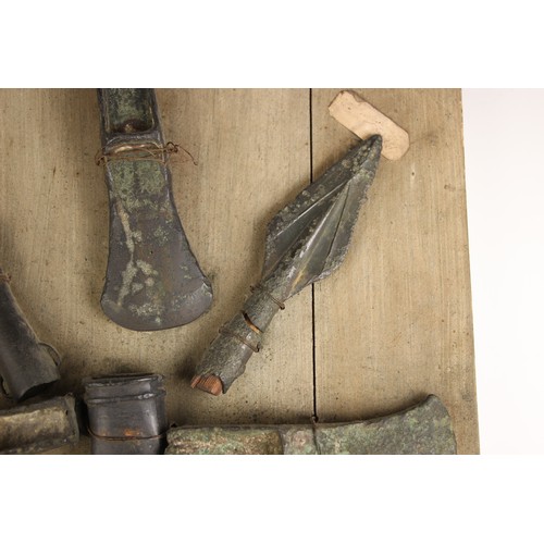 296 - Seven Ancient Bronze Axe and Spear Heads, together with two Iron Arrow Heads, Bronze Age and 14th ce... 