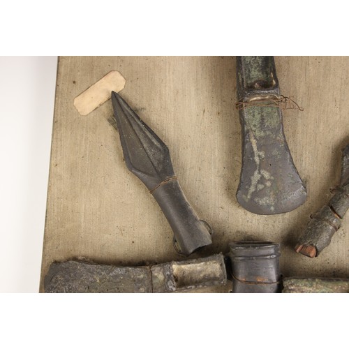 296 - Seven Ancient Bronze Axe and Spear Heads, together with two Iron Arrow Heads, Bronze Age and 14th ce... 