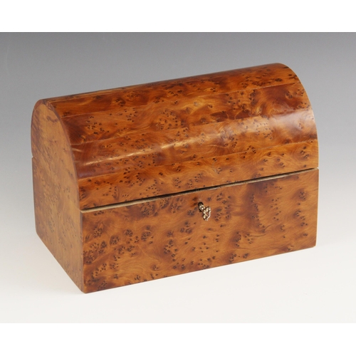 1071 - A burr yew and amboyna box, 20th century, the domed hinged cover opening to a vacant interior, 17cm ... 