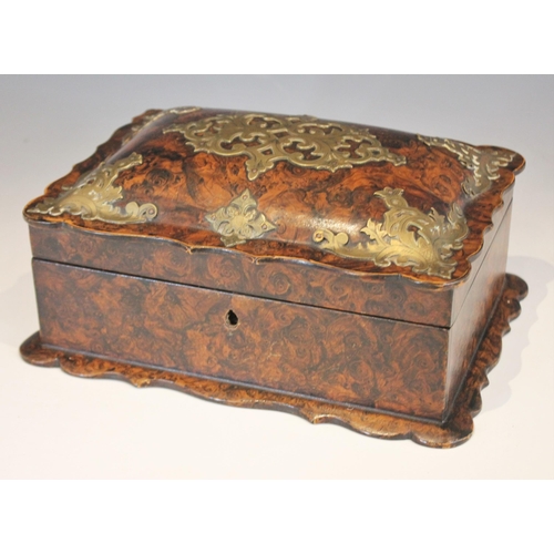 1073 - A 19th century faux tortoiseshell work box, the cushion top cover with shaped rim and brass pique, o... 