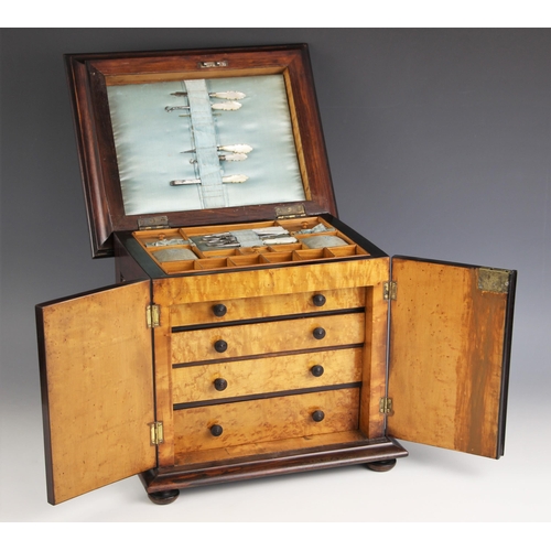 1077 - A William IV rosewood table top work box, the sarcophagus shaped hinged cover applied with moulded b... 