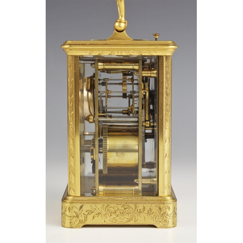 1083 - A brass cased repeater carriage clock, by Pierre Drocourt, late 19th century, the profusely chased c... 