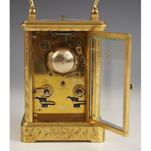 1083 - A brass cased repeater carriage clock, by Pierre Drocourt, late 19th century, the profusely chased c... 