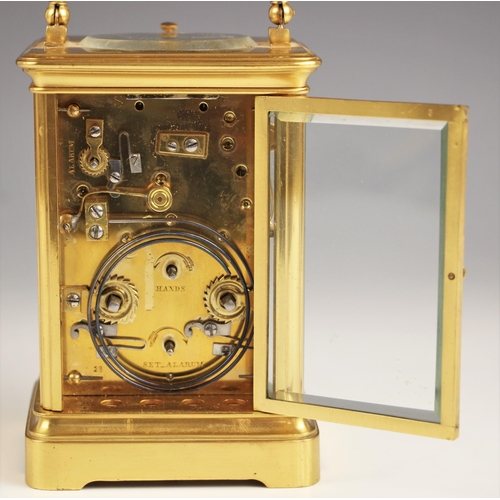 1084 - An early 20th century brass cased repeater carriage clock, with slow/fast indicator, 5cm enamelled d... 