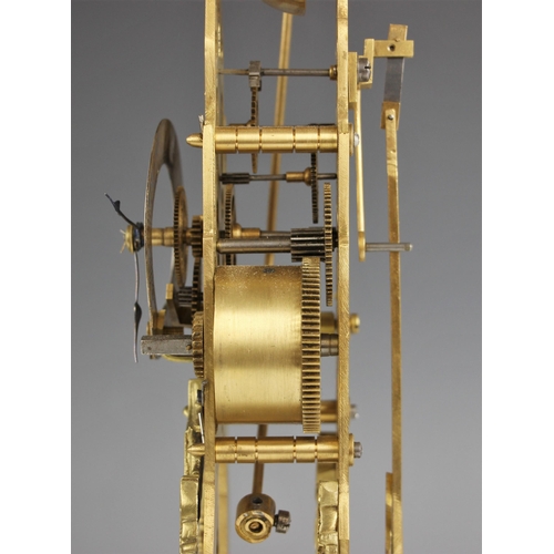 1087 - A brass Gothic influence skeleton clock, 20th century, with an 8cm silvered chapter ring, single tra... 