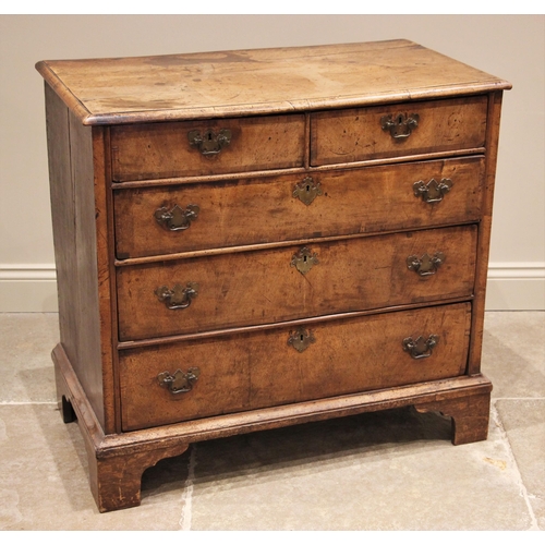 1098 - A William and Mary walnut chest of drawers, early 18th century, the rectangular moulded top over two... 