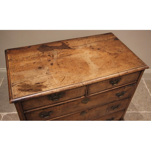 1098 - A William and Mary walnut chest of drawers, early 18th century, the rectangular moulded top over two... 