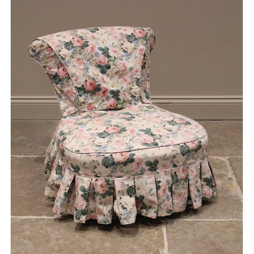 1169 - A Victorian low seat upholstered chair, the bow front sprung seat upon gilt wood vase shaped front l... 