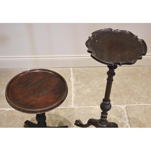 1186 - A Victorian rosewood wine/lamp table, the circular top with a moulded raised rim, upon a fluted, aca... 