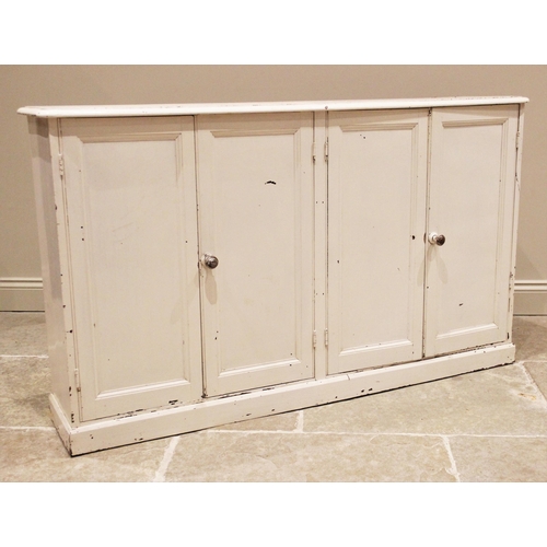 1191 - A Victorian painted pine kitchen/scullery cupboard, the rectangular moulded top with rounded front c... 