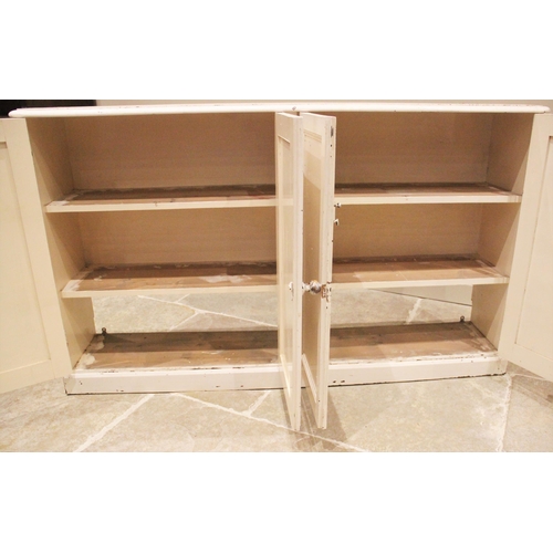 1191 - A Victorian painted pine kitchen/scullery cupboard, the rectangular moulded top with rounded front c... 