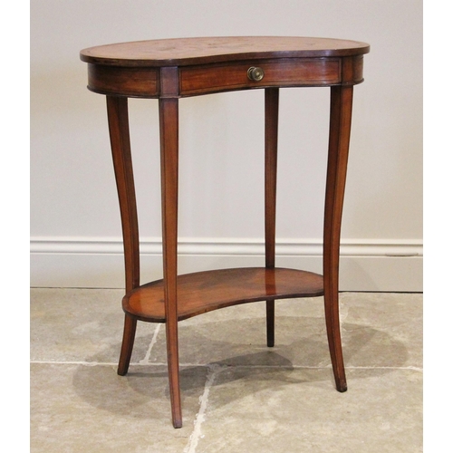 1207 - An Edwardian Sheraton revival kidney shaped occasional table, the banded top inlaid with a basket of... 