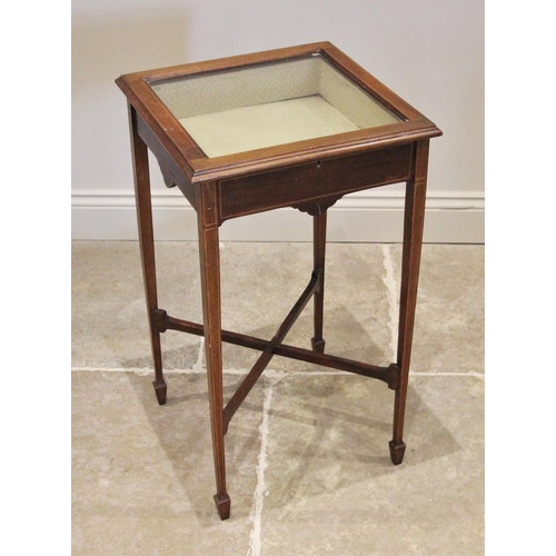 1208 - An Edwardian mahogany bijouterie table, the hinged square top inlaid with chequered stringing openin... 