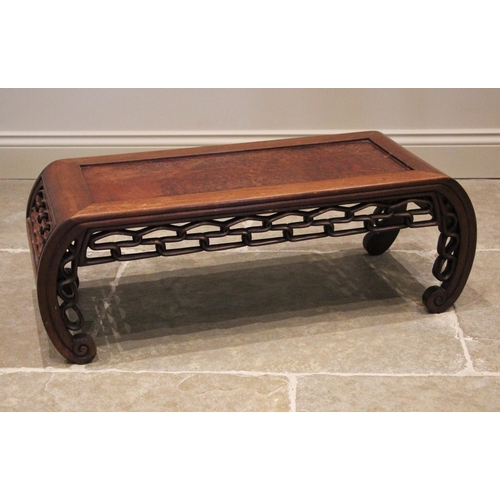 1209 - A Chinese hardwood opium table, early 20th century, the rectangular top inset with a panel, probably... 