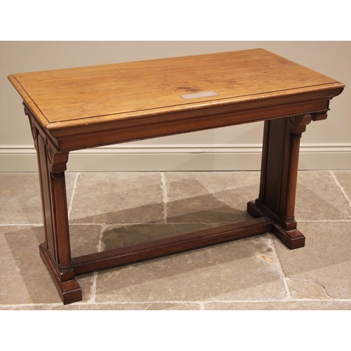 1213 - A walnut altar/side table early 20th century, the rectangular top with a moulded edge applied with a... 