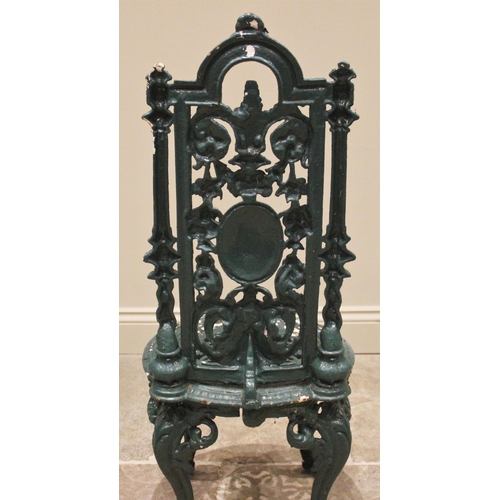 1239 - A Victorian Coalbrookdale style cast iron garden/patio chair, the openwork architectural high back c... 