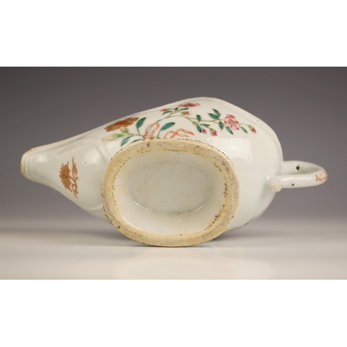 724 - A Chinese porcelain sauceboat, 18th century, decorated in the famille rose palette, with petal shape... 