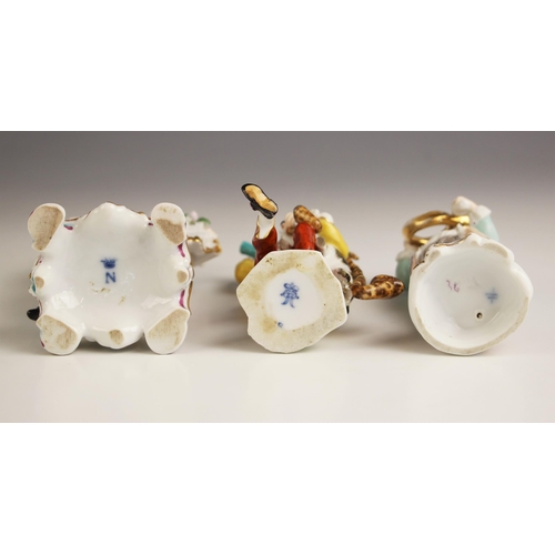 768 - Five continental porcelain figural groups, 19th century and later, comprising: a Volkskedt harlequin... 