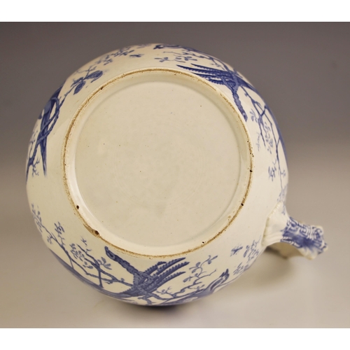 812 - An English blue and white transfer printed jug, 19th century, of typical bellied form with handle, d... 