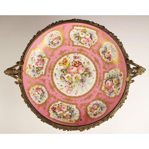 845 - A Sevres style tazza, late 19th century, the well polychrome enamelled with floral reserves against ... 