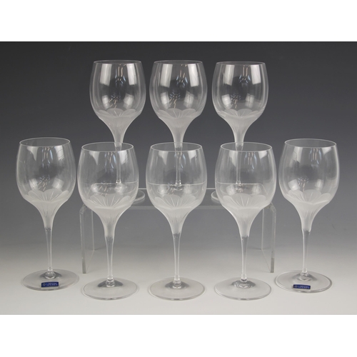 890 - Eight Cristal de Sevres 'Primavera' wine glasses, each with faceted floral etched decoration to the ... 