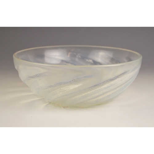 916 - A Lalique 'Poisson' opalescent glass bowl, 20th century, the circular bowl formed of stylised moulde... 