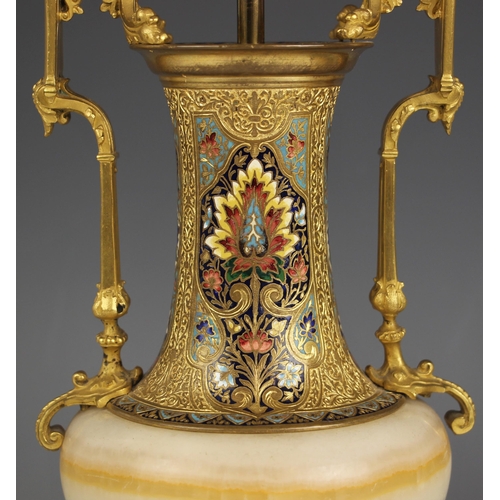 930 - A pair of onyx and champleve enamel table lamps, late 19th century, each of squat baluster form, the... 