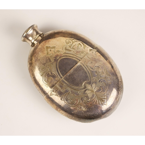 101 - A white metal hipflask, the oval hipflask with all over floral geometric decoration, with pull off s... 