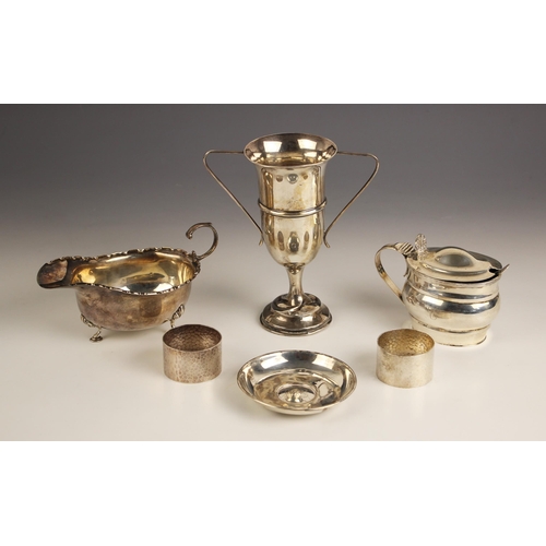 117 - A selection of silver items, including a George V silver sauce boat, E S Barnsley & Co, Birmingham 1... 