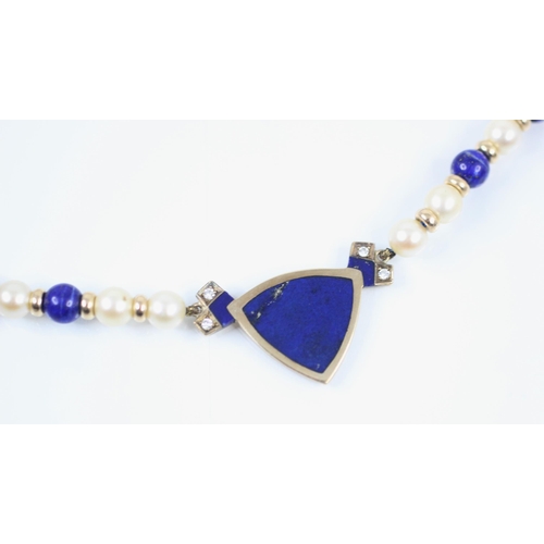 365 - An untested lapis lazuli and diamond 9ct yellow gold necklace, the spherical polished lapis lazuli b... 