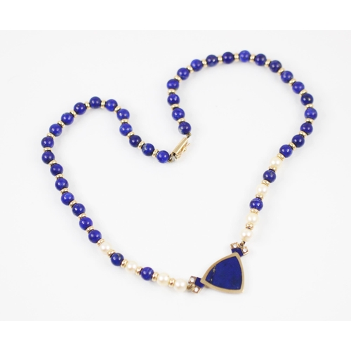 365 - An untested lapis lazuli and diamond 9ct yellow gold necklace, the spherical polished lapis lazuli b... 