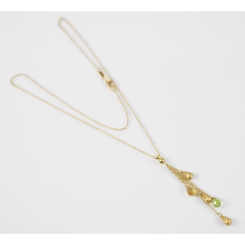 367 - A late 20th century citrine and peridot negligee style necklace, the graduated plain polished spheri... 